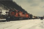 Manifest rolls west as it departs the yard